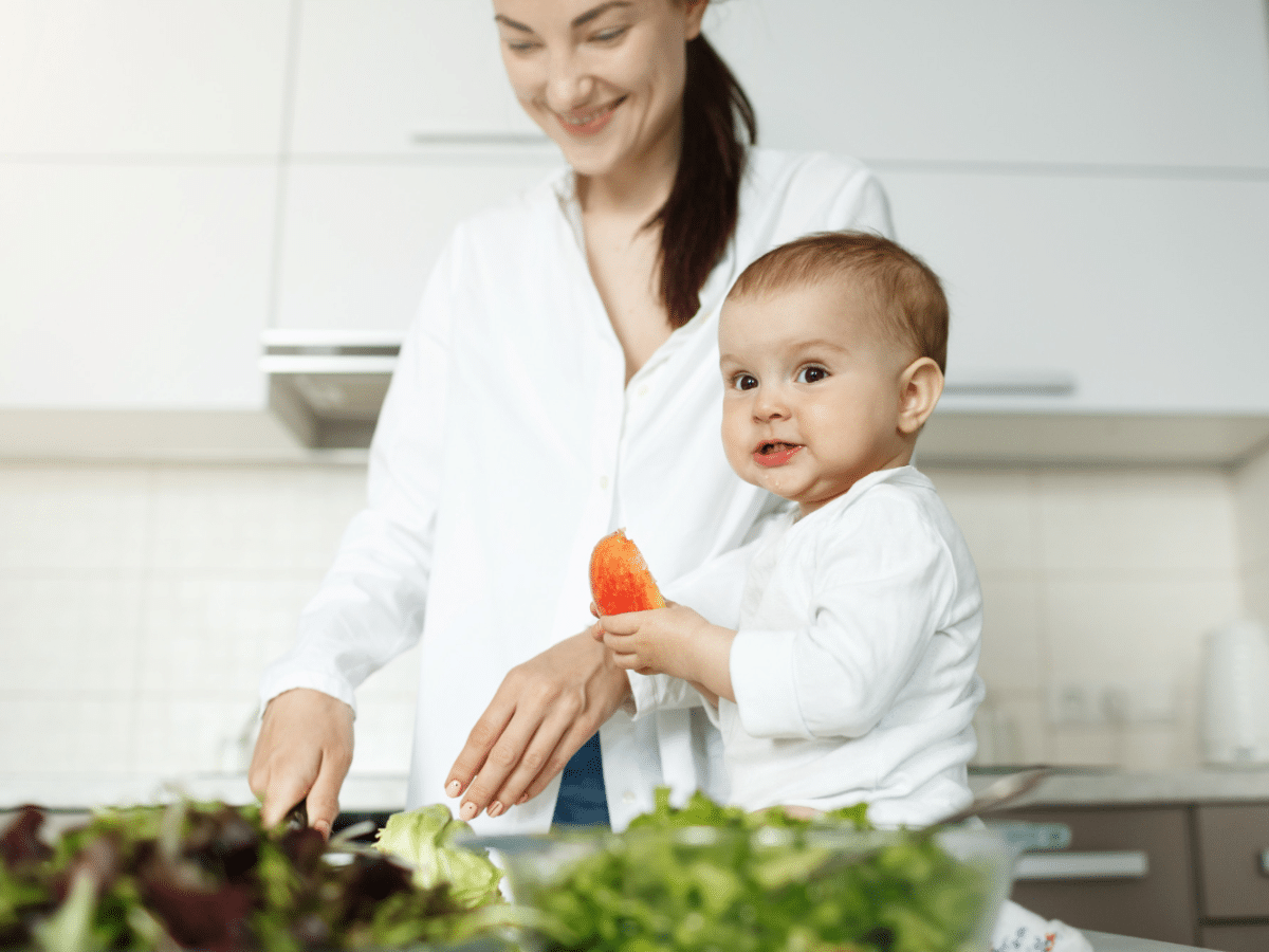 A woman prepares WIC approved foods for her toddler