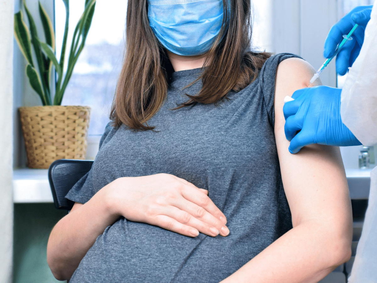 A pregnant woman is getting an RSV vaccine to protect her baby's health.